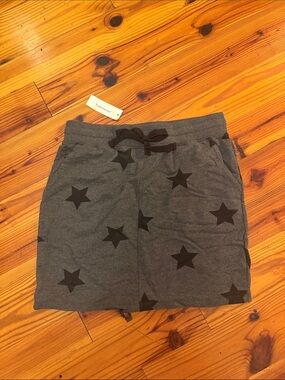 Francesca's Collections Charcoal Gray Mini Skirt with Black Star Print